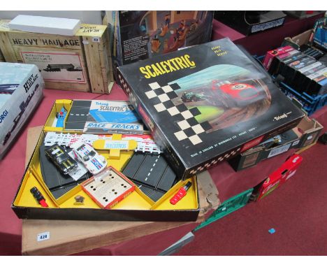 A 1960's GP3 Scalextric Set, including a red and a blue Lotus, appears lightly used, boxed, with outer card box. Plus two 197