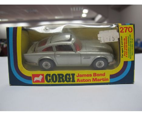 A 1977 Corgi No. 270 James Bond Aston Martin, in silver, overall good with some chipping, all working parts appear to operate