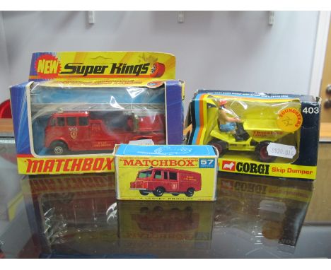 A Matchbox 1:75 No. 57 Landrover Fire Truck, Matchbox Superking No. K-15 Fire engine, Corgi No. 403 Dumper. All very good, bo