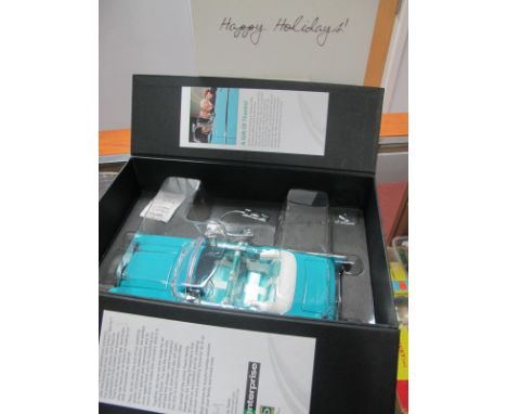 A 1:24th Scale (?) Diecast Model of a 1957 Chevy Bel-Air, finished in turquoise and white, a 50th Anniversary boxed set issue