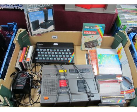 A Sinclair ZX Spectrum Home Computer, WHSmith computer program data recorder, joystick, software including ZX Spectrum comput