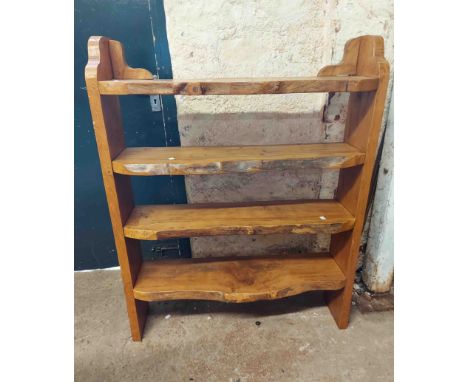 A 91cm rustic elm four shelf open bookcase with natural fronted shelves and shaped sides