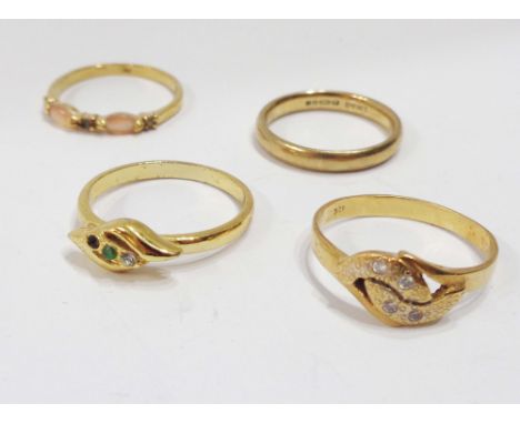 A 9ct. gold wedding band and a marked 18k cross-over ring - sold with two gilt metal dress rings - sizes P, R, R 1/2 and R re