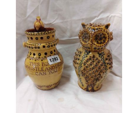 A Harry Juniper Bideford Pottery puzzle jug with bird whistle finial and incised motto - sold with a similar owl form lidded 