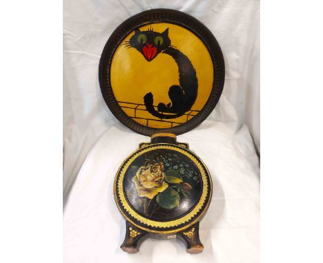 A Watcombe Torquay terracotta wall plaque with black painted stylised meowing cat motif on a yellow ground - sold with a simi