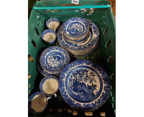 A box containing a quantity of Burleigh Ware willow pattern teaware including cups and saucers, plates, etc.