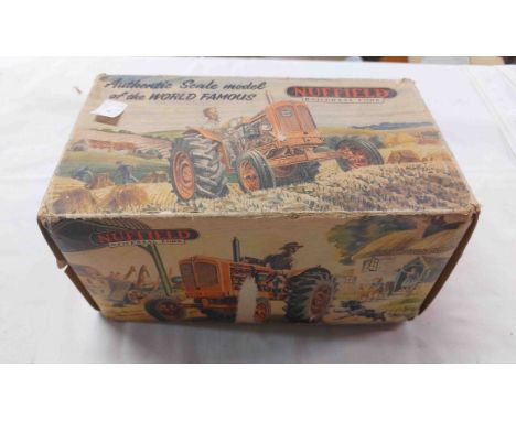 A vintage Raphael Lipkin Nuffield Universal Four toy tractor model in original box - box torn