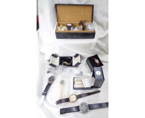 various watch cases containing a collection of modern gentlemen's wristwatches - many with related paperwork including two Be