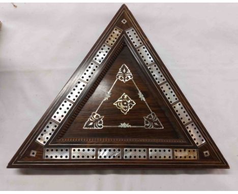 An antique rosewood triangular cribbage board with mother-of-pearl inlay and carved bone pegs - beading missing