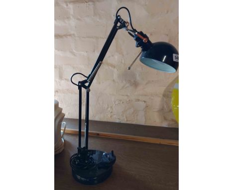 A modern anglepoise style adjustable desk lamp with black painted finish
