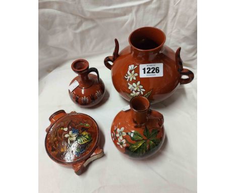 Four pieces of Watcombe high fired terracotta comprising two of ewer form, small moon flask and double handled vase, each wit