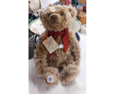 A 2006 Steiff Teddy bear made in a limited edition of 3000 with brown fur, internal growler and button to ear with original t