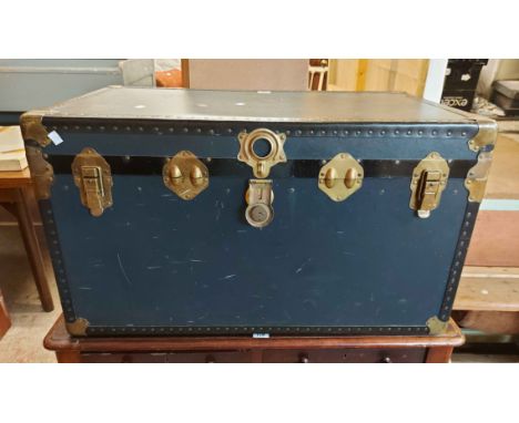 A 93cm vintage metal bound and blue finish travelling trunk