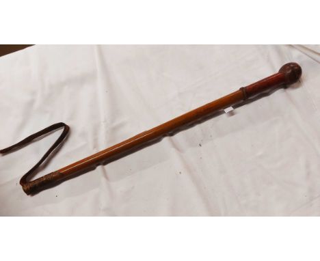 An antique swagger stick/knobkerrie with leather clad hilt and leather strap (a/f)