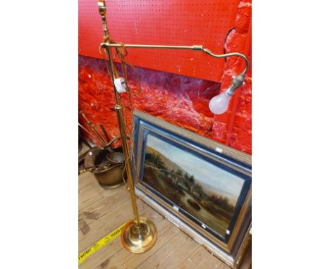 A vintage brass telescopic standard lamp in the antique style