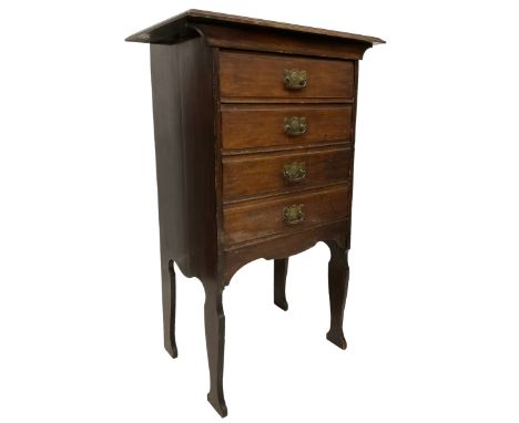 Late Victorian walnut music cabinet, moulded rectangular top over four manuscript drawers with fall fronts, fitted with shape