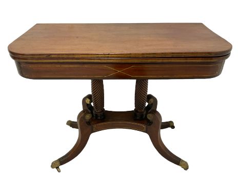 Regency mahogany card table, rectangular fold-over top with rounded corners, twin rope-twist pillars on platform, four splaye