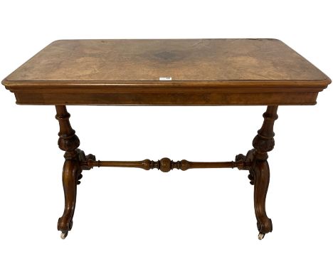 Victorian figured walnut stretcher card table table, rectangular swivel and fold-over top with moulded edge and inset baize l