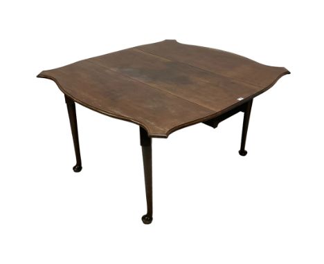 George III mahogany dining table, shaped and moulded drop-leaf top, gate-leg action base, on turned cabriole supports with pa