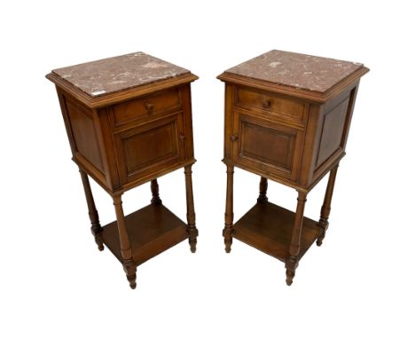 Pair of early 20th century French walnut pot cupboards or bedside lamp tables, with rouge marble top in moulded frame, single