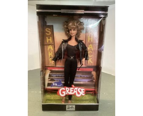 Mattel Barbie doll ; Barbie collector Sandy from Grease collector edition 2003, dressed in Black Biker Jacket and biker attir