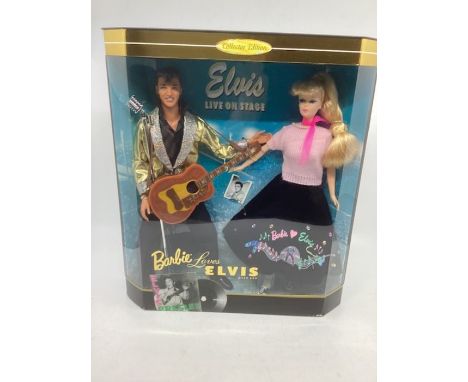 Mattel Barbie and Elvis &nbsp;gift set, dual 1996 Live on stage and Ken is Elvis &nbsp;and Barbie is all dressed to dance! Be