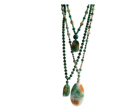 Three Chinese jade sautoir necklaces in the flapper style, All the necklaces are hand knotted, most of the beads are dyed. Th