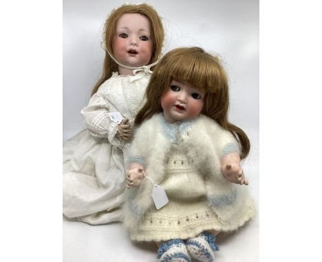 Antique dolls pair. German Heubach 342 15.5&rdquo;bent limb flirty eye character baby doll and an A10M 18&rdquo; with the int