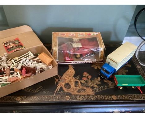 Britains Farm tractor Vehicles and farm set of pieces and a boxed harvester vehicle. Die cast and plastic pieces all vintage 