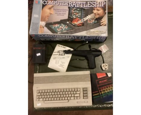 Sinclair Action Pack Light gun with manual and Sinclair power box, a Commodore 64 personal computer Keyboard and a boxed 1977