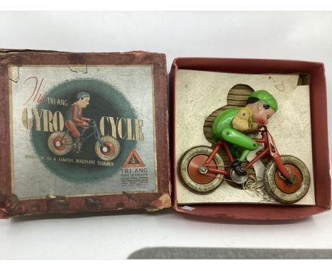 Antique 1936 tinplate and steel Triang toy; The Gyro Cycle Made In England , Merton London. Good antique toy( wheels turn and