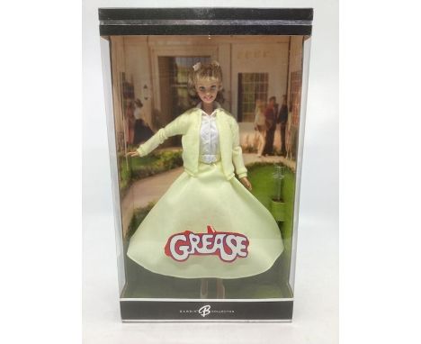 Mattel Barbie doll ; Barbie collector Sandy from Grease , in primrose film attire 2004, mint boxed and part of the Grease col