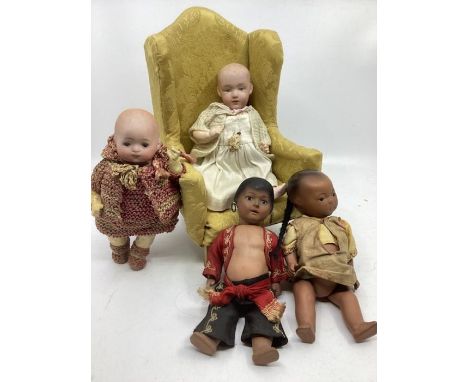 Antique small bisque head dolls to Include A Gebruder Heubach intaglio eyes bisque head baby doll on original bent limb body 