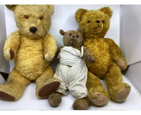 Antique teddy bear with boot button eyes and old antique baby outfit c 15&rdquo; and a further Golden Likely Anker German goo