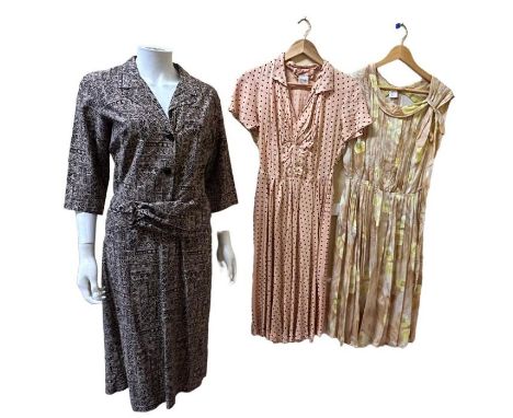 An early 60s sundress with buttercup print, a 1940s polka dot dress by Rembrandt (s/d), a 1950s brown and cream checked dress