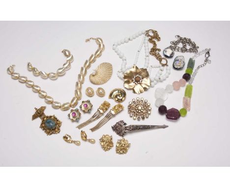 A collection of designer costume jewellery, to include; a 'moon snails' bracelet and necklace suite by Michael Michaud, a 'sh