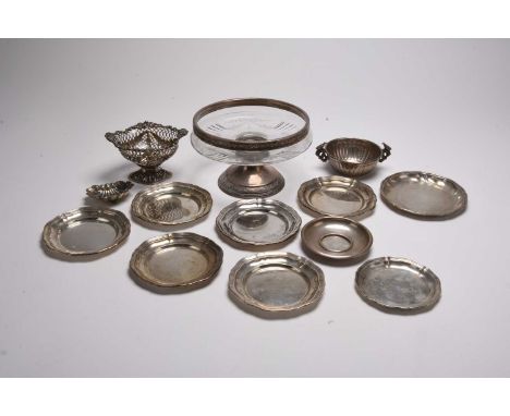 A small collection of silver and white metal, comprising; a Victorian pierced bon bon dish, a white metal Mexican dish, nine 