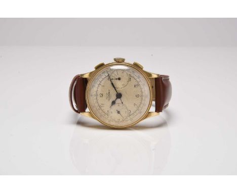 Tavannes: A gentleman's 18ct gold chronograph wristwatch Date: Circa 1950 Movement: Jewelled manual wind Dial: Silvered, blac