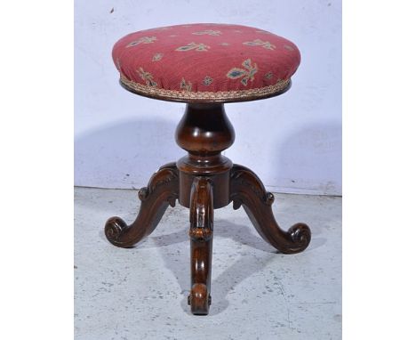 Victorian stained wood adjustable piano stool, Fleur de Lys patterned upholstery, baluster column on carved tripod legs, diam