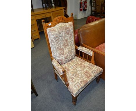 Edwardian stained beechwood armchair, carved cresting, machine made tapestry style upholstery, 68cm.