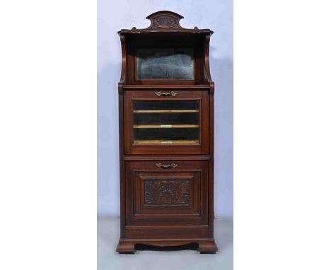 Victorian walnut music cabinet, serpentine shelf over a mirror panel with a flap front section over a closed flap, with a car