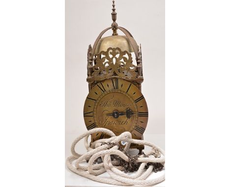 Brass cased lantern clock, bears signature Thos Moon, Ipswich, 38cm.