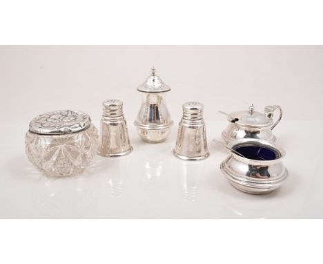 Three piece silver condiment set, Birmingham 1934, Capstan style, a pair of sterling silver condiments, glass jar with a silv