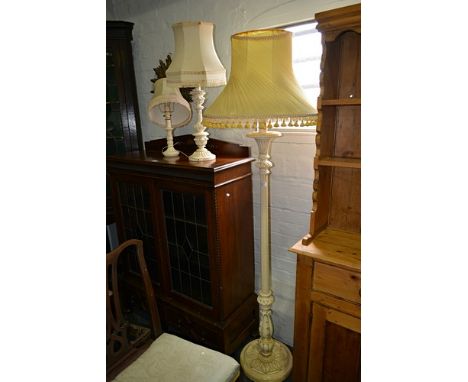 Cream painted standard lamp, fluted column, circular platform with shade, height 183cm and two cream painted standard lamps (