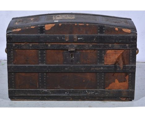 Old dome top trunk, wooden slat, metal banding, width 81cm.