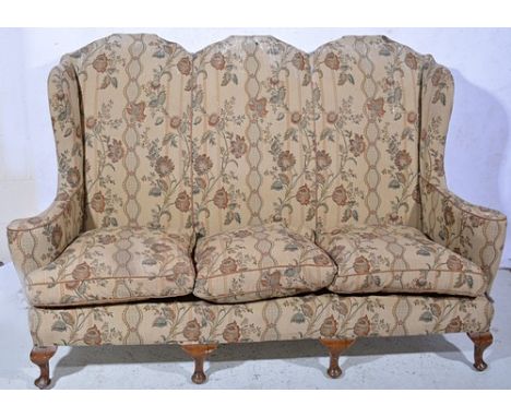 Queen Anne style chair back three seat sofa, upholstered in patterned cotton, stained beechwood cabriole legs, width 183cm.