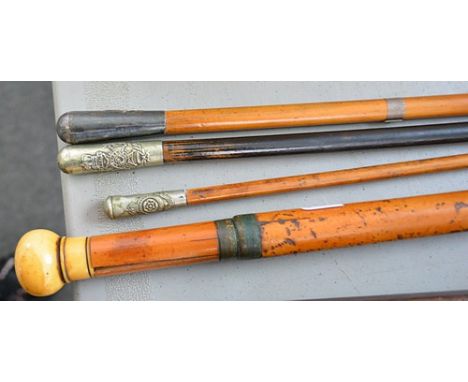 Three swagger sticks and an antique sword stick, with an ivory pommel (4).