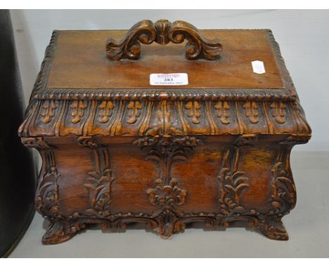 Reproduction hardwood Chippendale sarcophagus shape tea caddy, carved decoration, width 29cm and a reproduction chinoiserie d