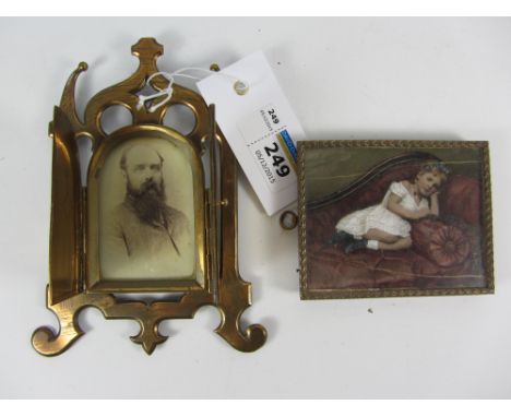 Late 19th century brass portrait miniature frame and a Victorian portrait on ivory