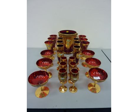 Suite of Bohemian ruby and gilt drinking glasses 